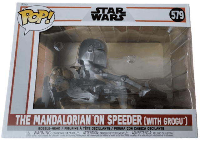 the mandalorian on speeder with grogu 579